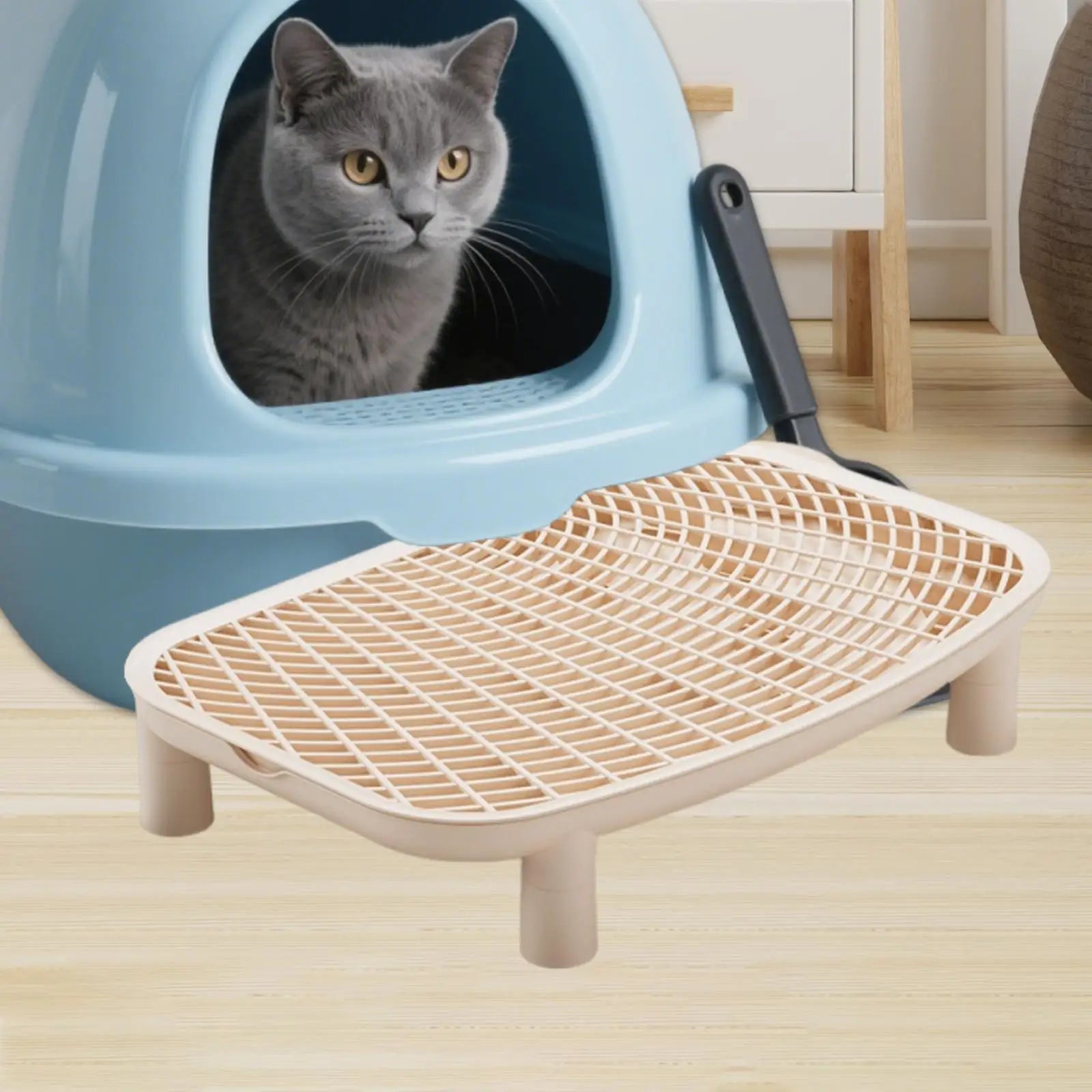 White cat litter box anti-tracking ramp with raised grid surface and four short feet.