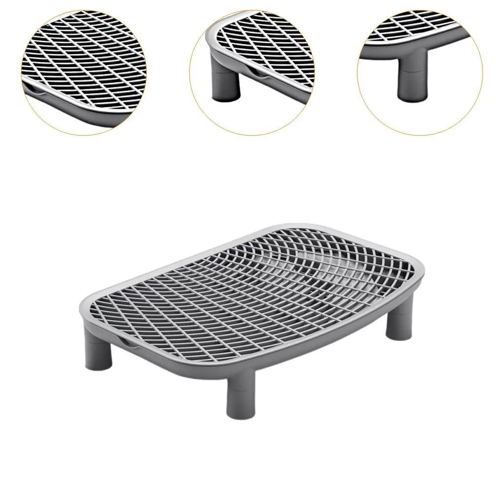 Gray cat litter box anti-tracking ramp with white grid top and short support feet.