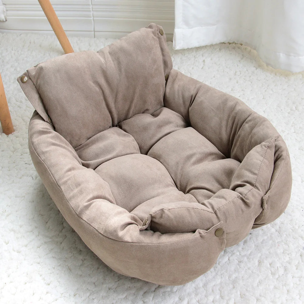 Brown pet sofa bed nest with cushioned side bolsters and quilted inner pad