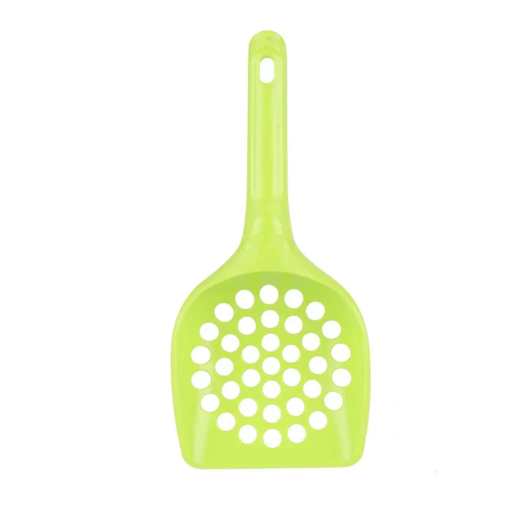 Green plastic cat litter shovel with perforated scoop and handle cutout