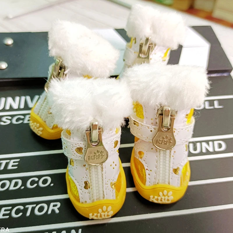 Pet snow boots set with white fluffy cuffs, gold buckles, white uppers, yellow soles