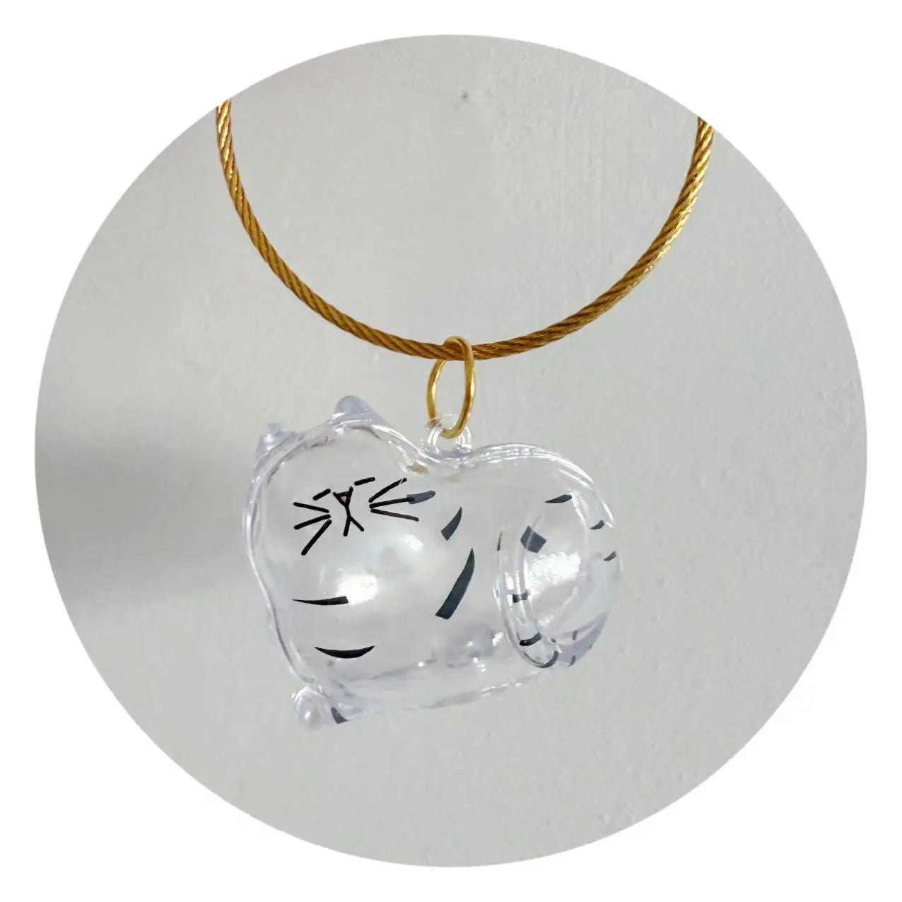 Resin cat-face capsule keychain pendant on gold cord