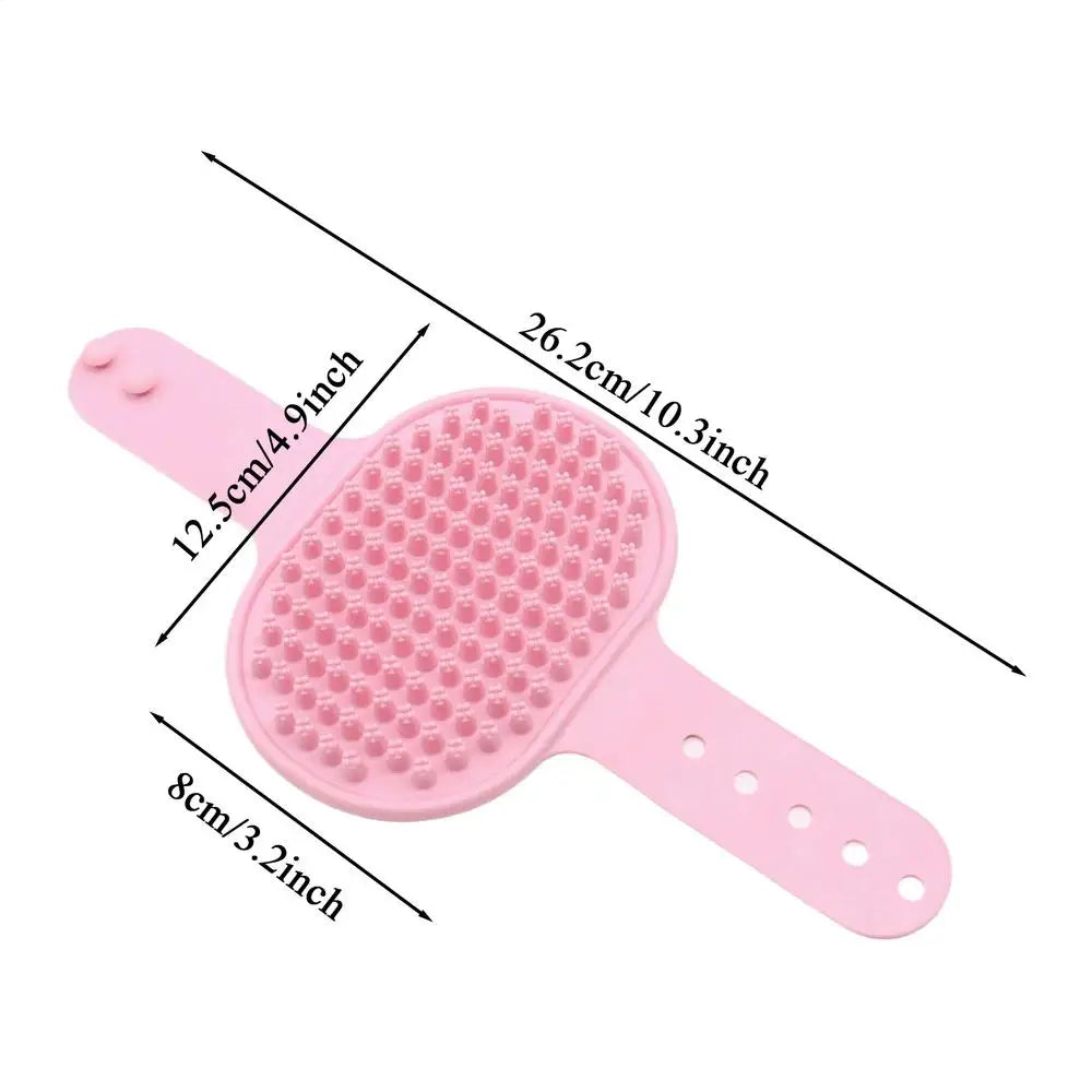 Pink silicone pet grooming massage brush with round bead pad and wide handle