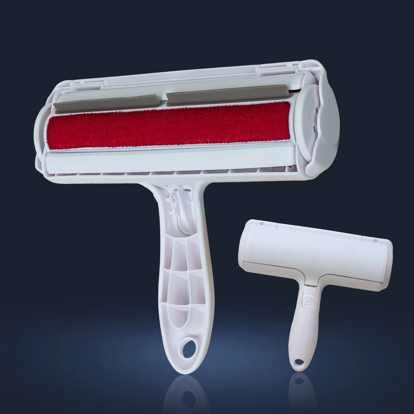 Handheld pet hair remover roller with red roller head and self-cleaning base