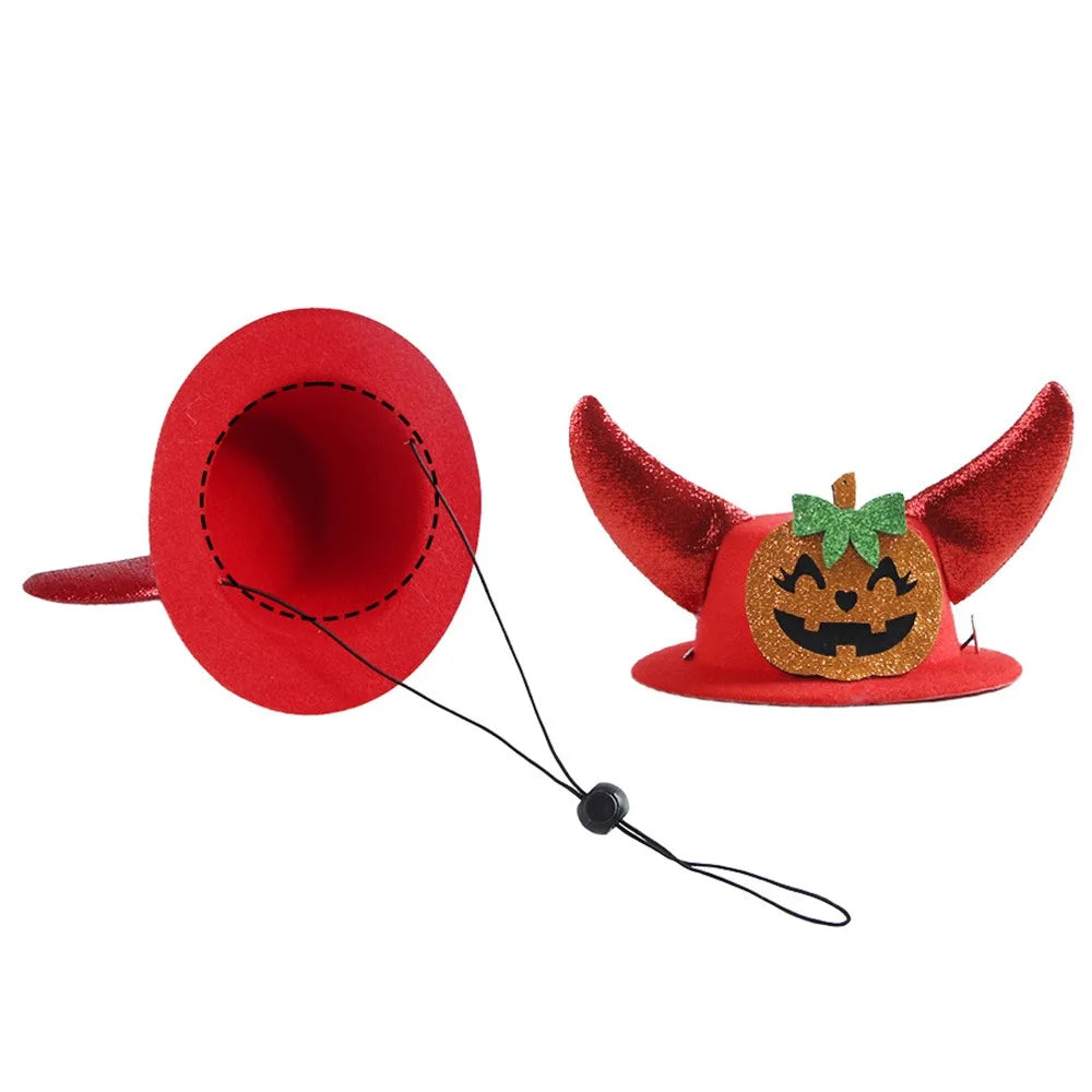 Red felt pet horn hat with jack-o-lantern patch, green bow, and chin strap