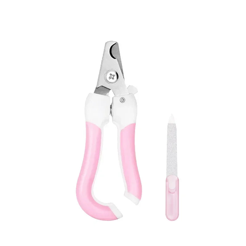Pet nail clipper with pink grips and white body, includes nail file