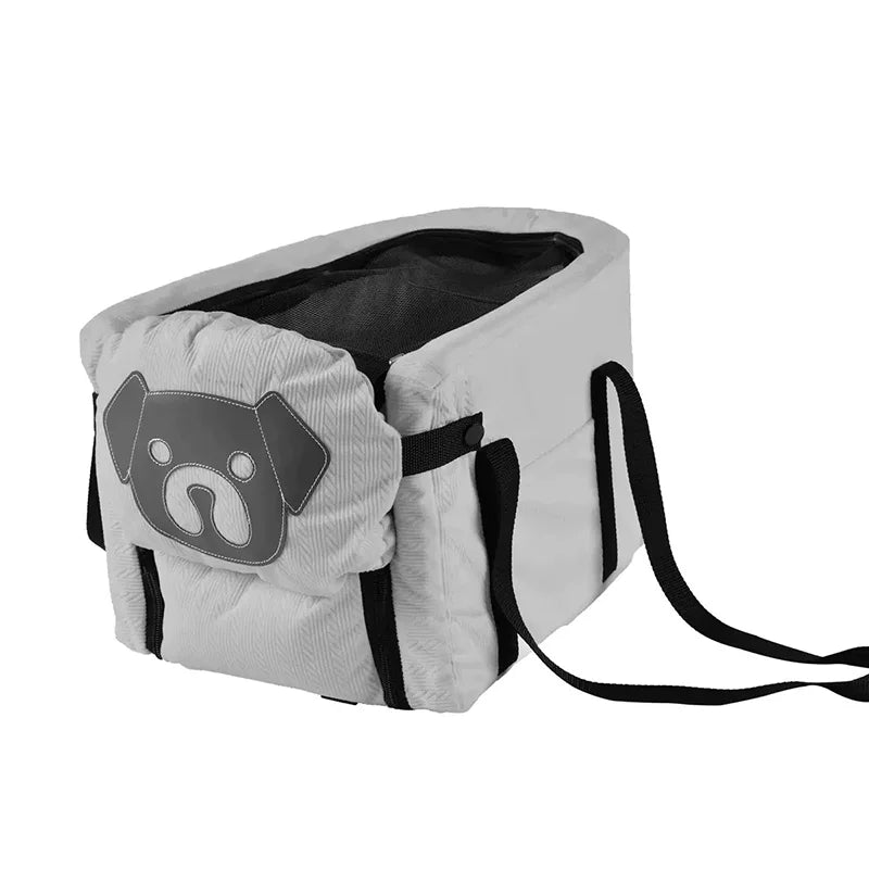 Pet carrier backpack bag in light gray/white with black trim and dog face patch front.