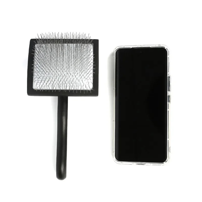 Black double-sided pet grooming brush with silver metal deshedding pins