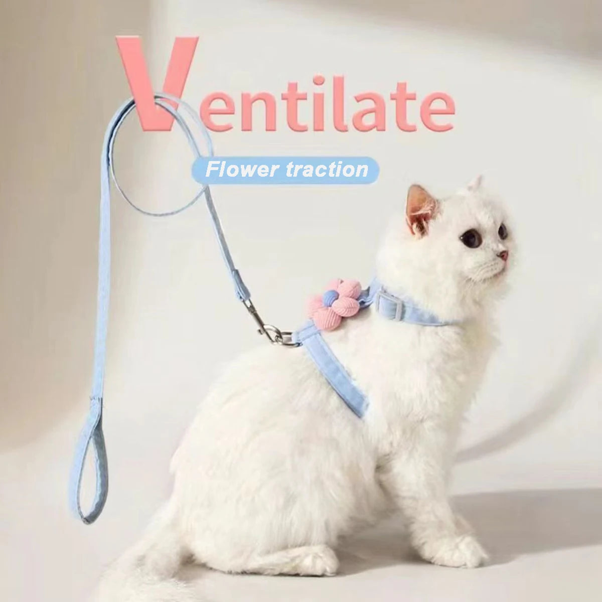 Cat harness and leash set with blue straps and pink flower charm