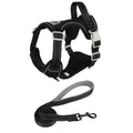Black dog harness vest with adjustable buckles and matching leash set
