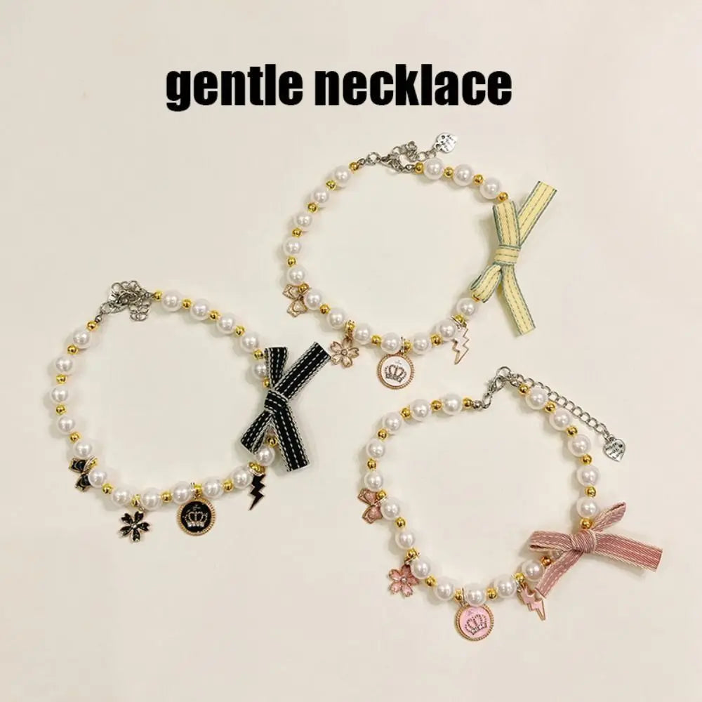 Cat pearl necklace collar with charms and ribbon bows, shown in multiple styles