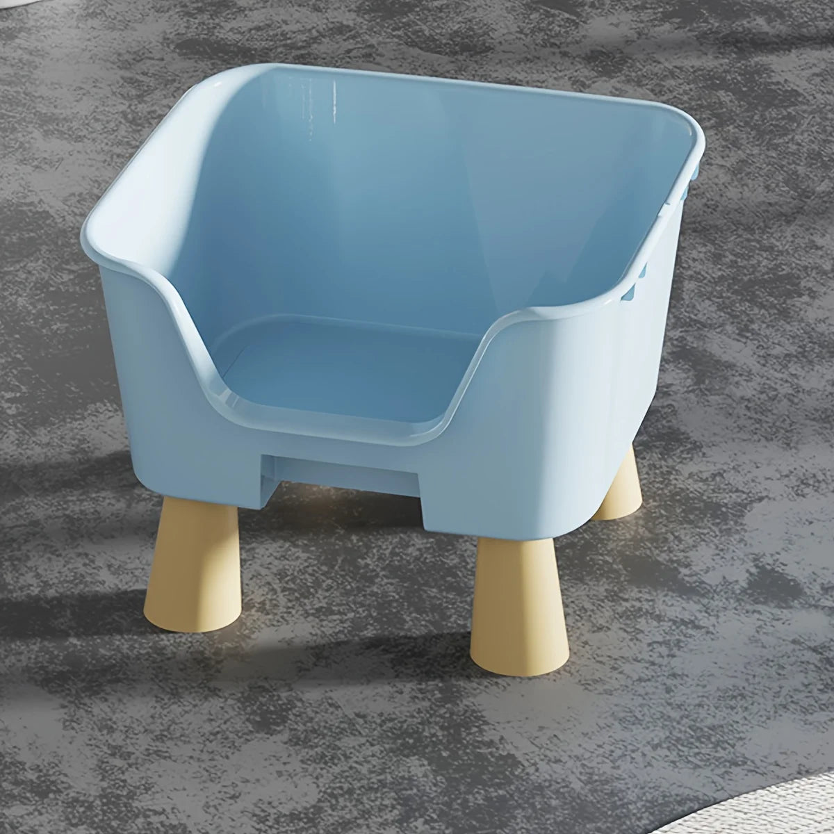 Blue and white cat bed with raised sides and front entrance cutout, on light legs.