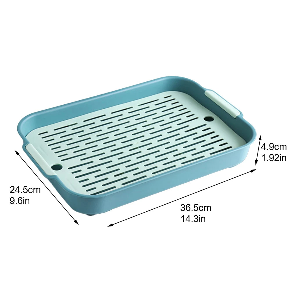 Small pet litter box with teal tray and vented light-gray insert grate, side handle