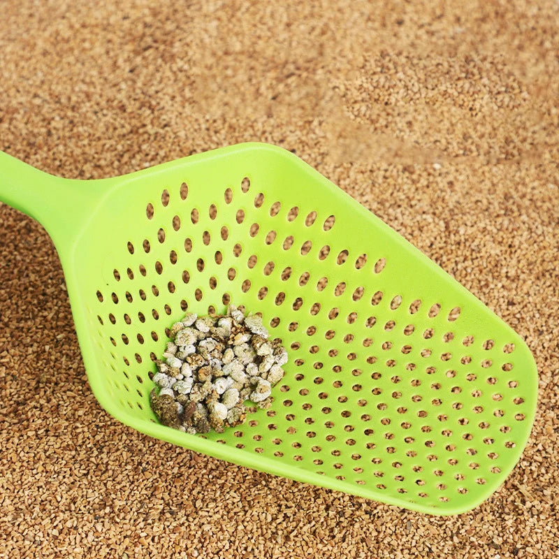 Large cat litter scoop sifter, green perforated pan with litter inside