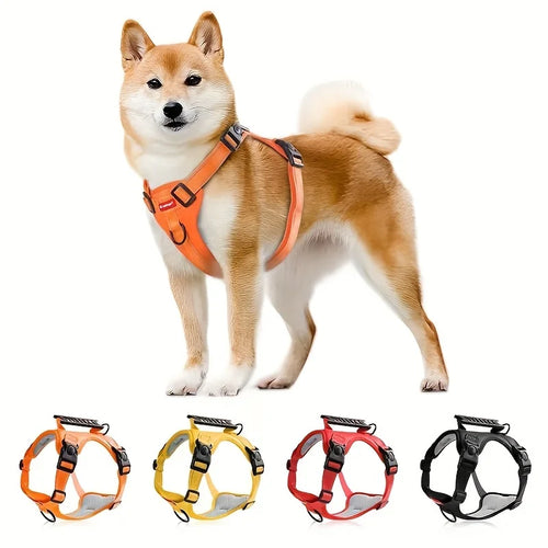 Adjustable padded dog harness with orange straps and front control handle