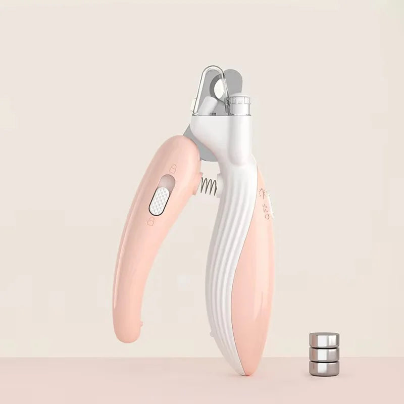 Pink pet nail clippers with white guard and metal holder for pet nails