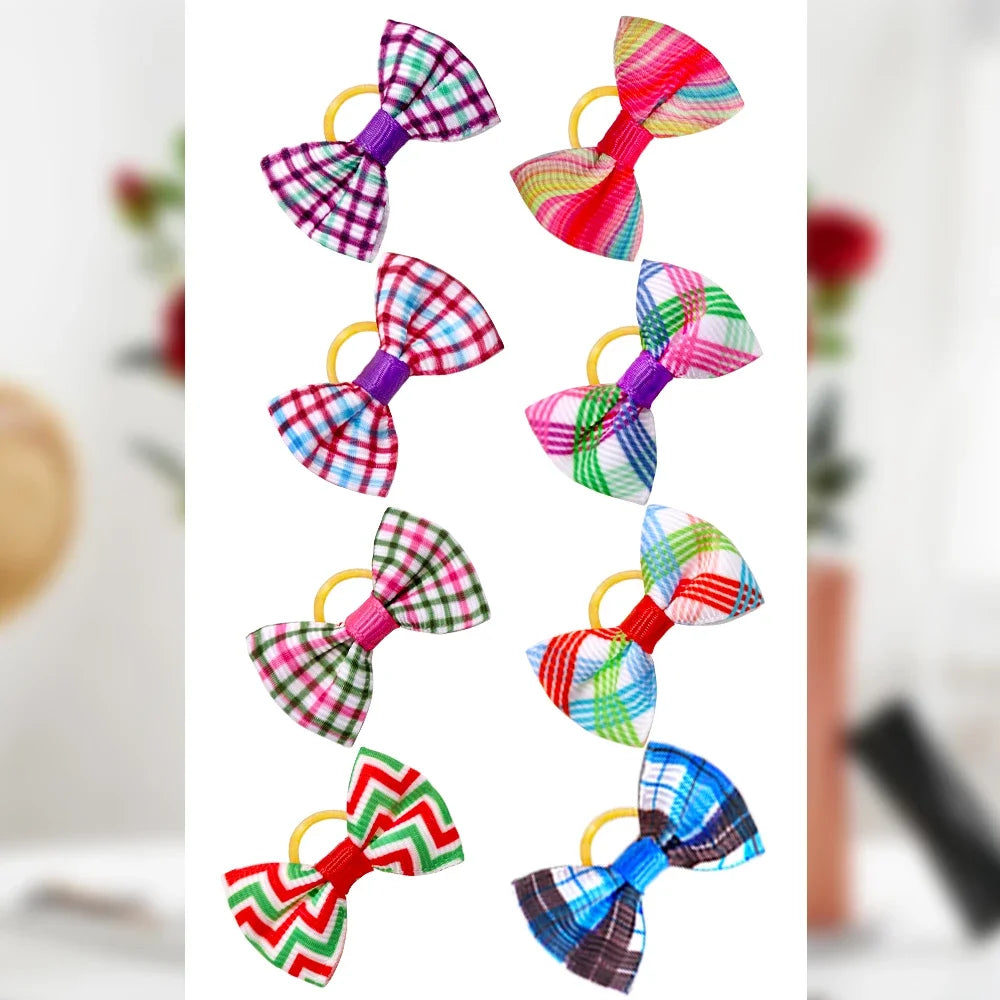 Assorted plaid and striped dog hair bows with gold elastic loops