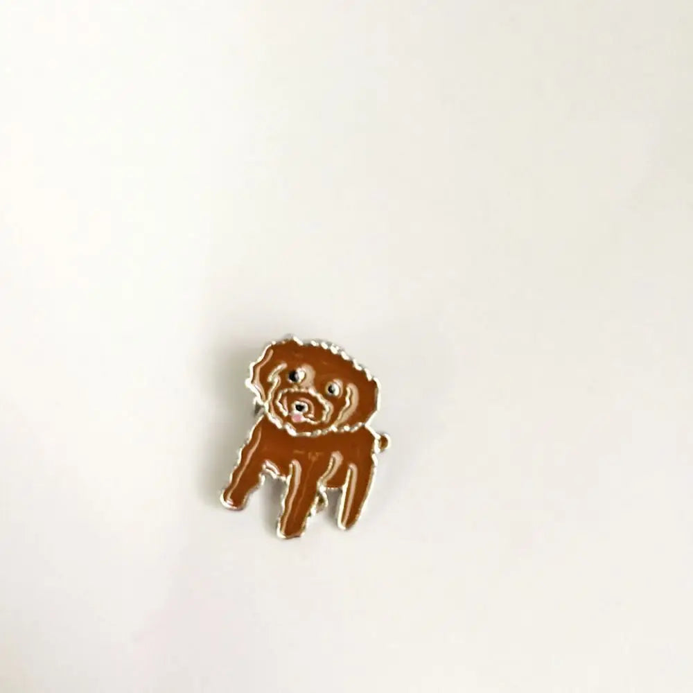 Brown cartoon dog enamel pin badge with shiny metal outline