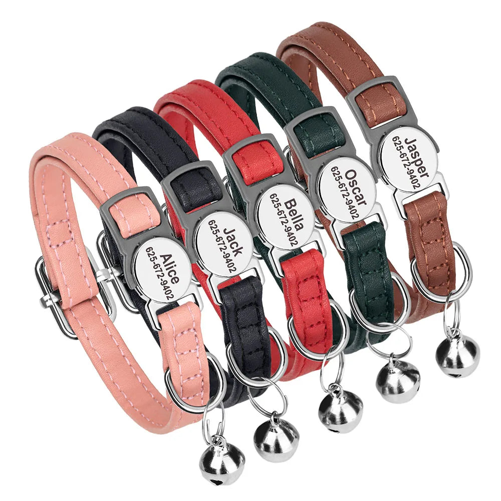 Set of PU leather cat collars in pink, black, red, and green with ID tags and bells