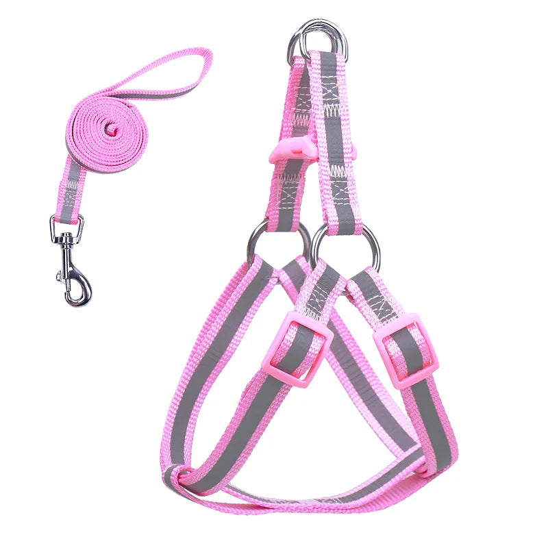 Reflective pink-and-gray dog harness vest with leash clip and D-ring