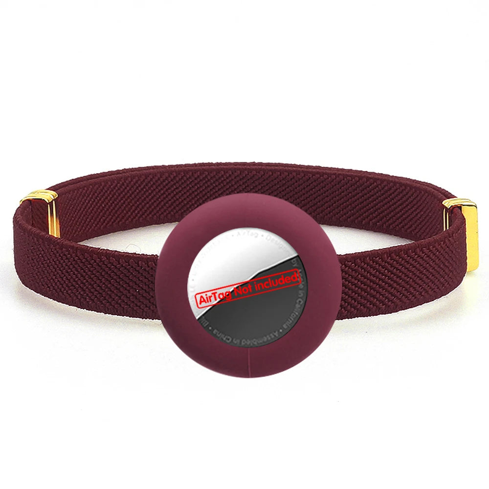 Burgundy cat collar with AirTag holder, safety breakaway clasp and gold hardware.