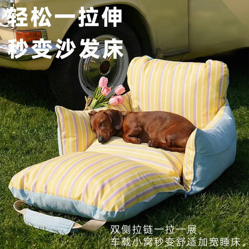 Pet warm nest carrier on grass, yellow base with blue striped pillows and side openings
