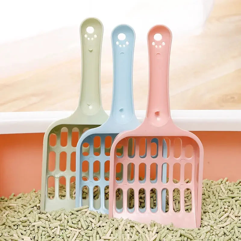 Cat litter sand scoop set with three scoops in green, blue, and pink