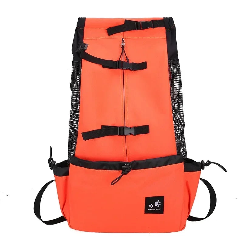 Orange dog travel carrier backpack with black mesh sides and front adjustable straps