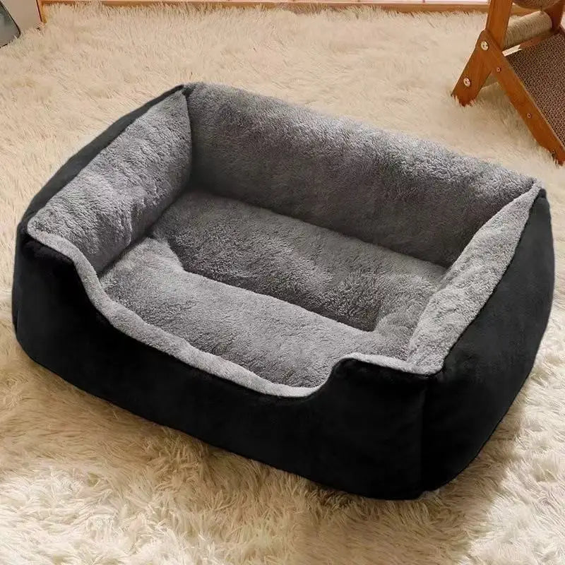 Cat basket bed with dark gray fleece interior and black outer cushion, padded bolsters