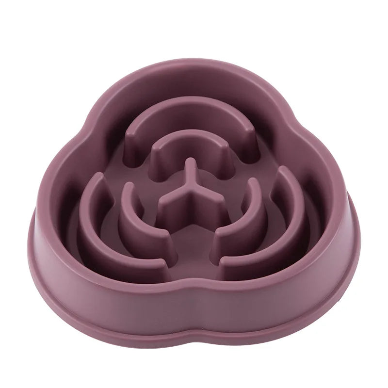 Purple slow-feeding pet bowl with anti-choke maze feeder insert, close-up