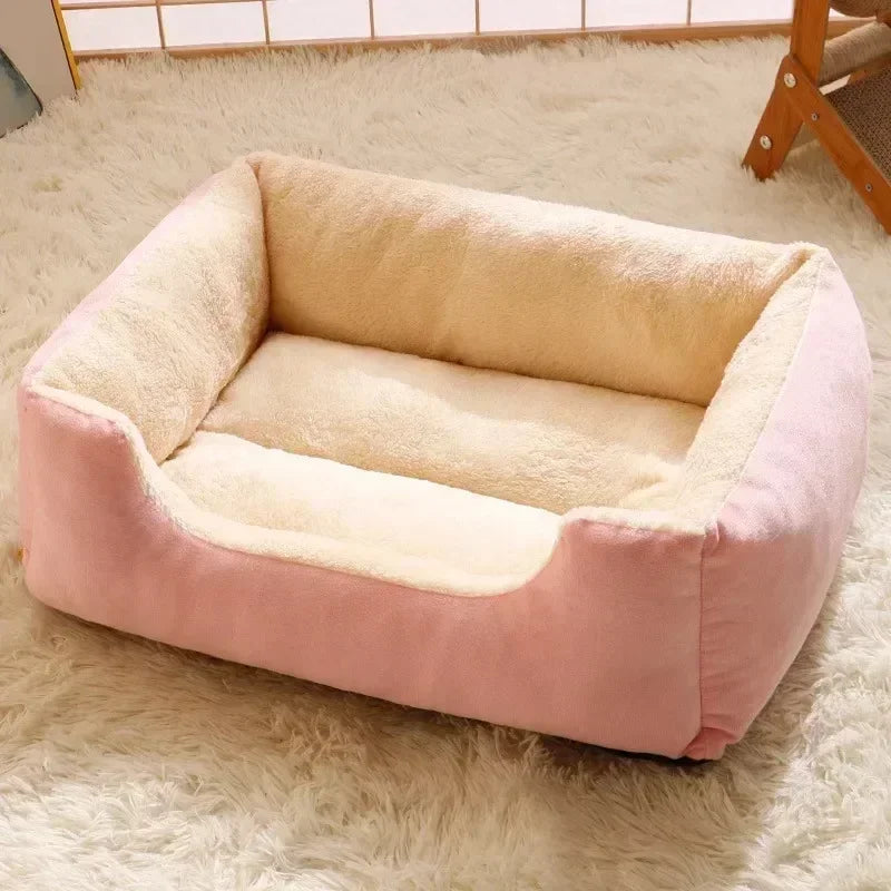 Cat basket bed with cream fleece interior and pink outer cushion, padded bolsters