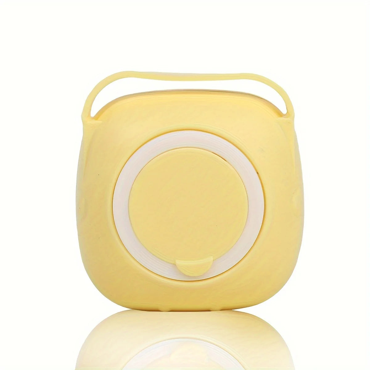 Yellow silicone pet grooming brush with circular bristle pad and handle loop