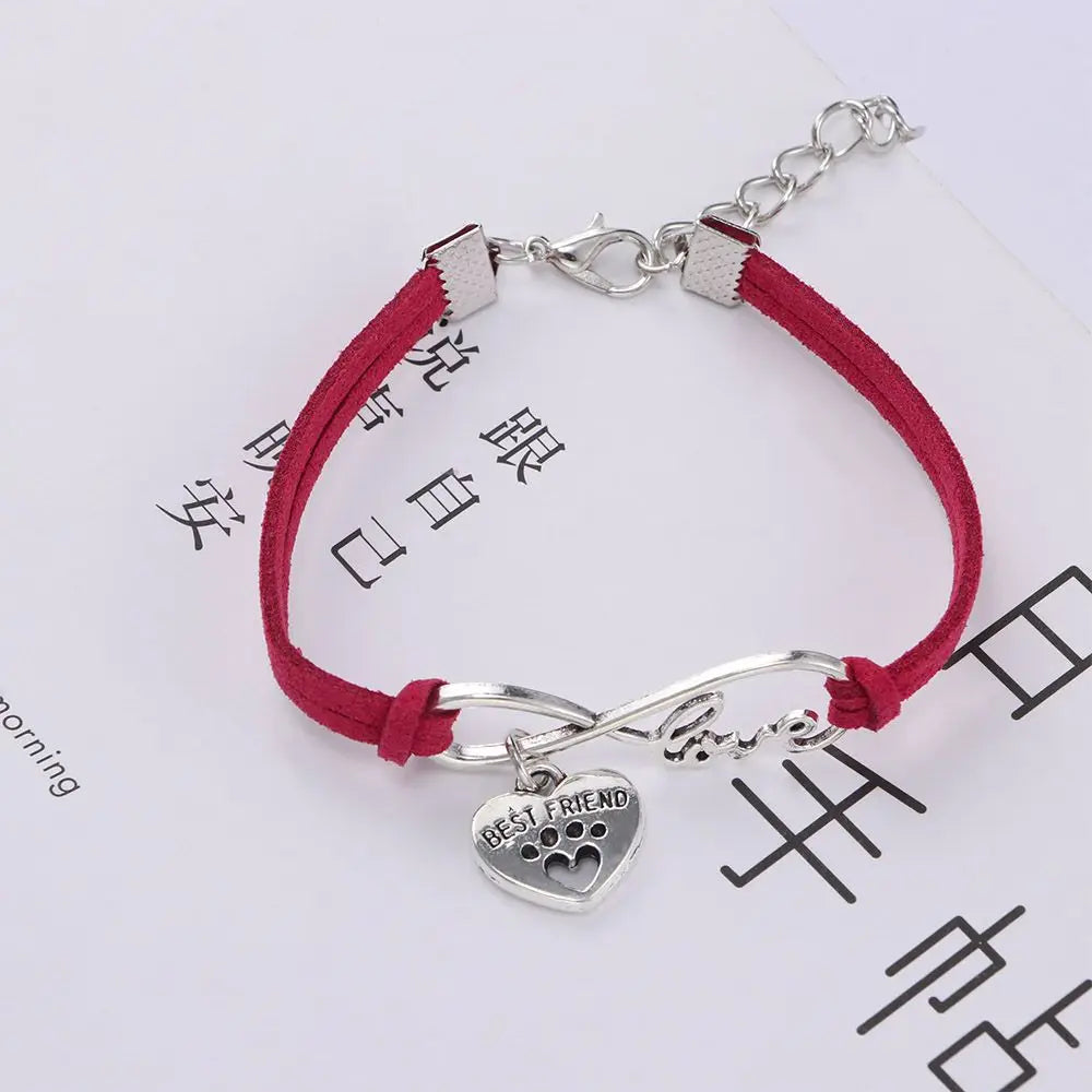 Adjustable red pet collar with heart “Best Friend” charm and silver “love” bar connector