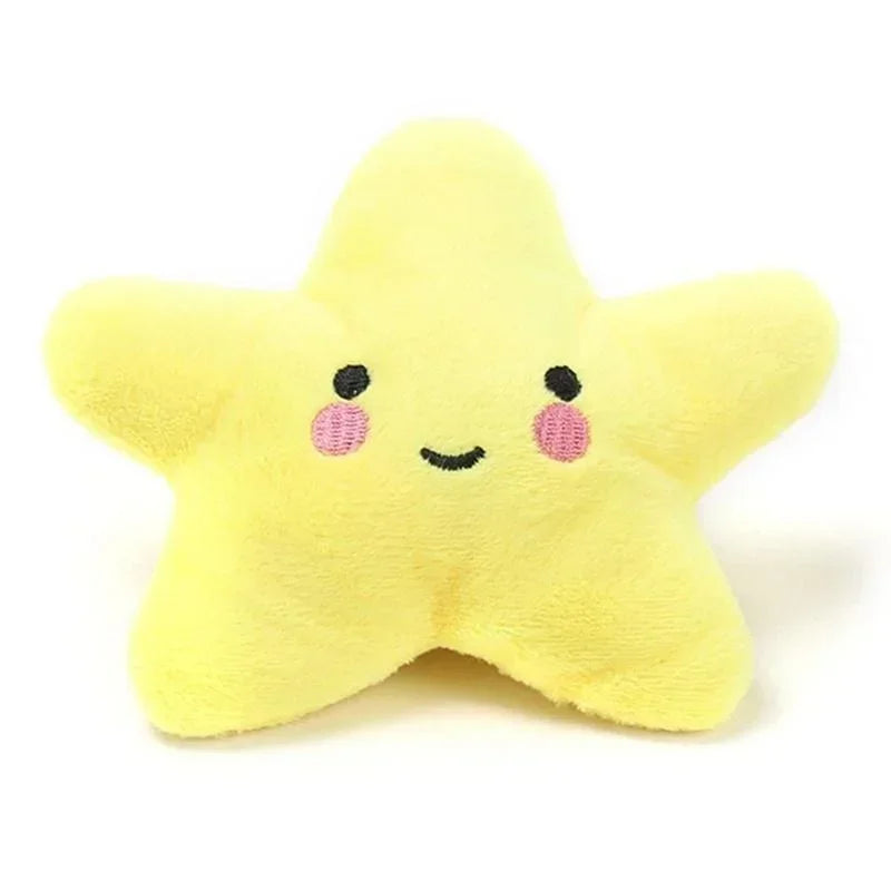 Yellow star-shaped plush toy with embroidered face and pink cheeks