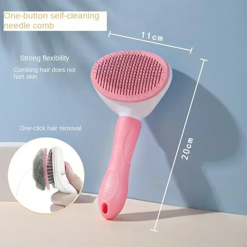 Pink needle comb pet brush with circular head and pink handle