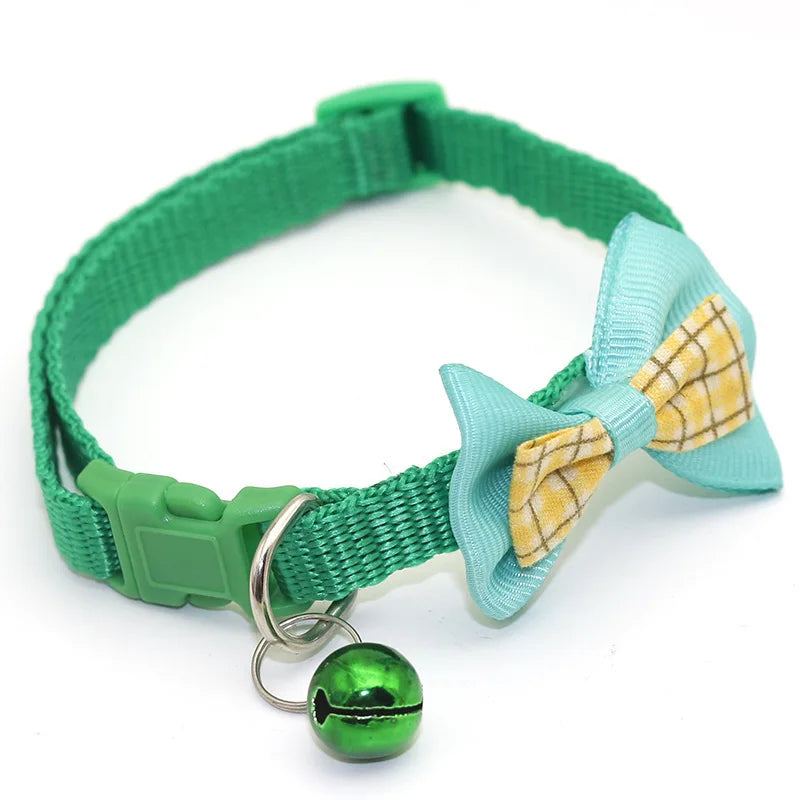 Green cat collar with plaid bow tie and round green bell