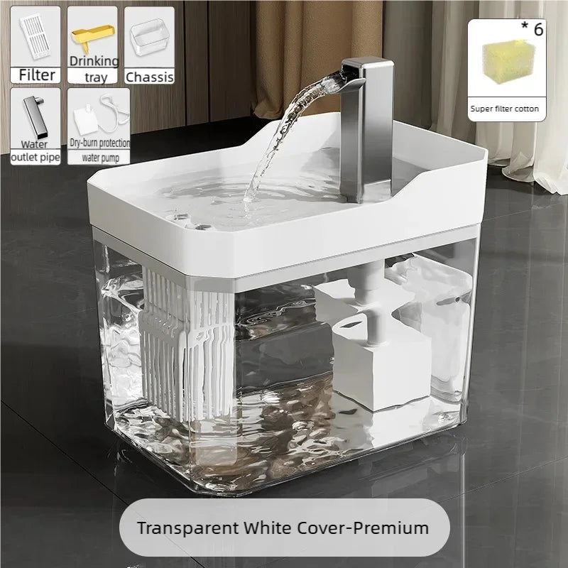 Cat water fountain with white cover, clear reservoir, and water flowing from spout
