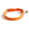 Elastic cat collar with bell; orange strap with metal buckle and ring