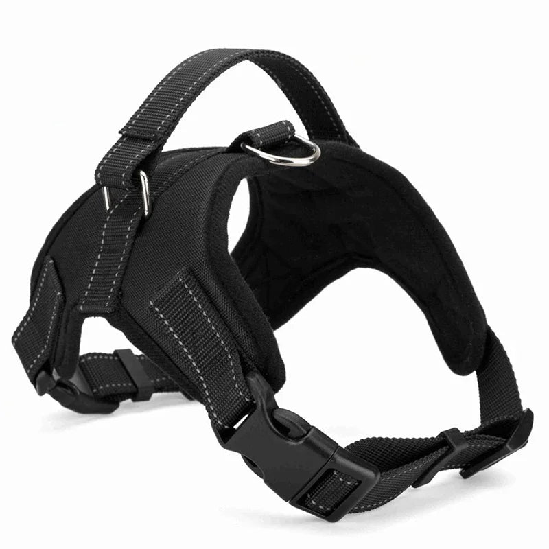 Black dog harness vest with adjustable chest strap and metal D-ring on the neck