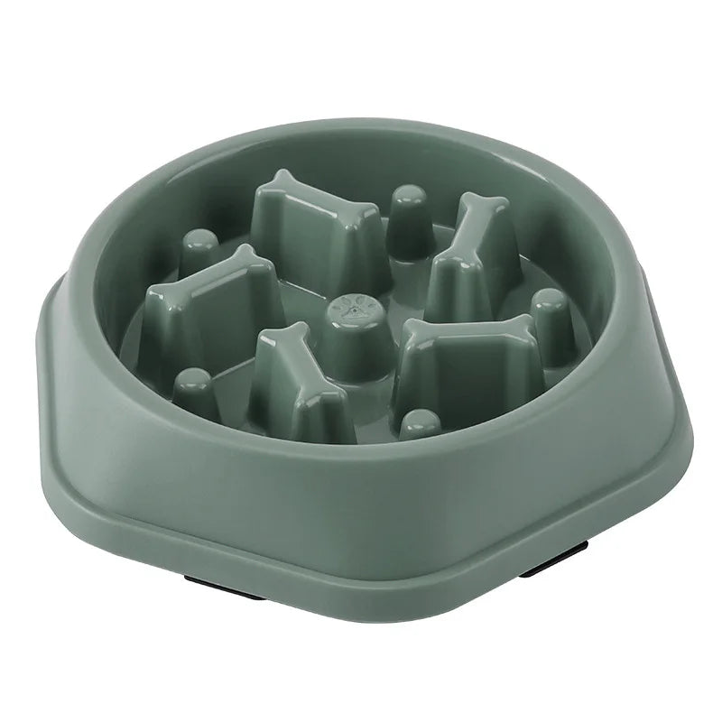 Green slow-feeding pet bowl with raised anti-choke maze insert