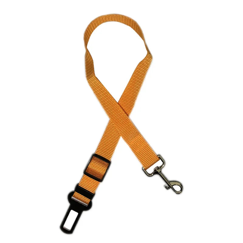 Adjustable pet car safety harness clip belt, brown-orange strap with buckle and metal carabiner clip.