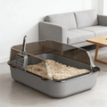 Semi-enclosed cat litter box with scoop, dark gray base and clear entry panel