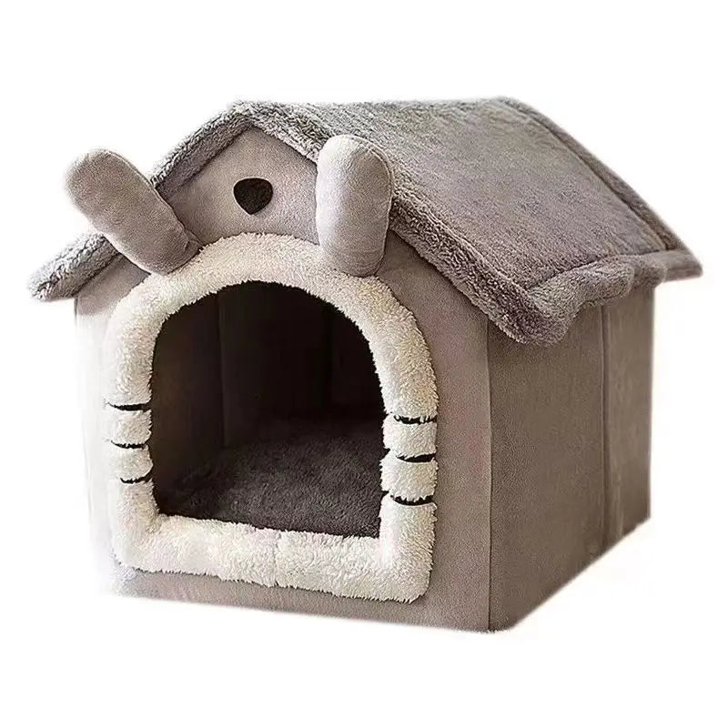 Grey plush indoor pet tent bed with tunnel entrance, side supports, and padded roof