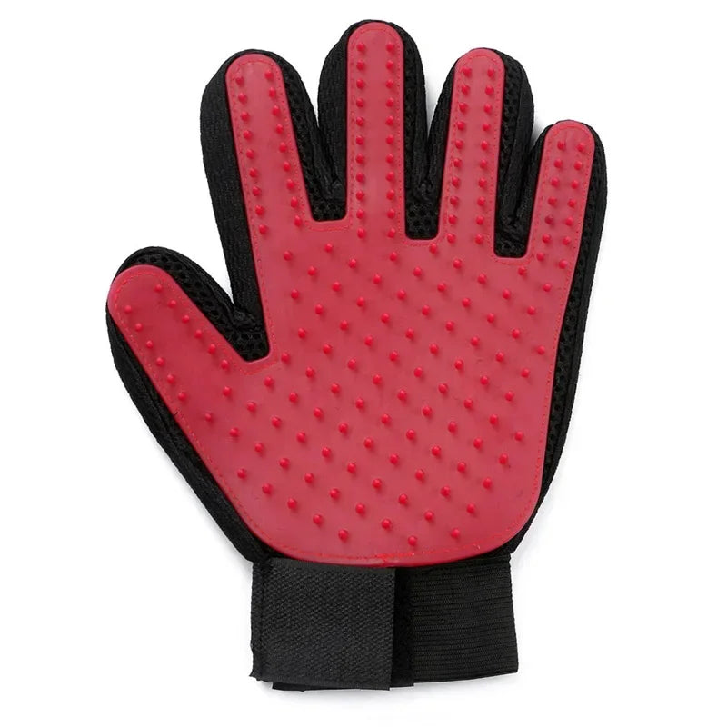 Red silicone pet grooming glove with raised nubs and black fabric wrist strap