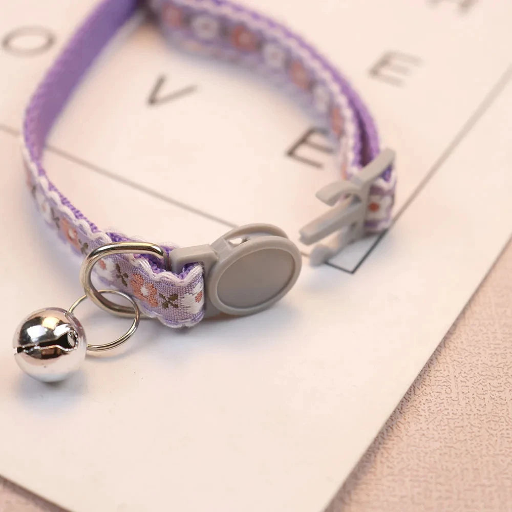 Floral lace cat collar with bell in purple, with gray clasp and metal bell