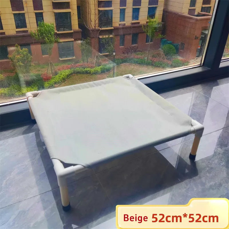 Beige foldable pet hammock bed with white legs and square fabric sleeping area