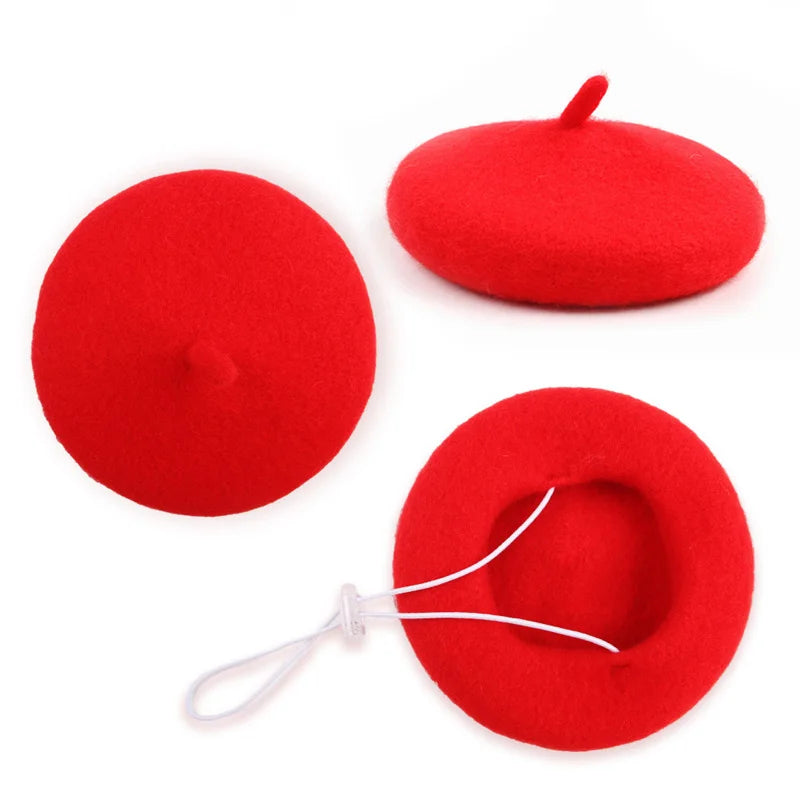 Red felt pet beret hat with small top pin and hanging white cord