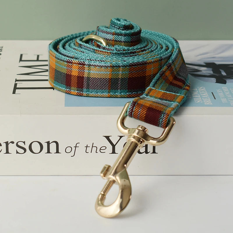 Plaid leash with rolled strap and gold-tone hook clasp, teal orange check