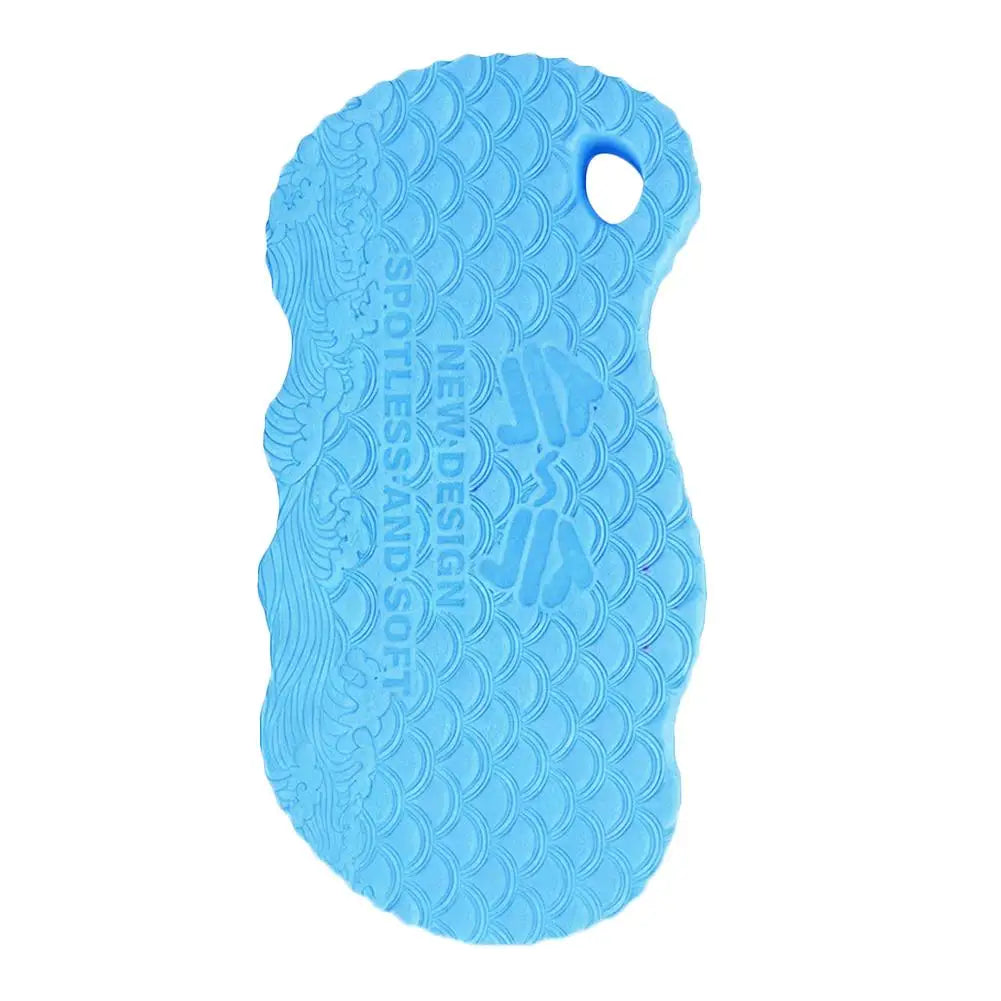Blue exfoliating bath sponge with embossed scale pattern and hanging hole