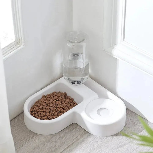 White dual pet bowl feeder with water dispenser and dry food tray, corner design